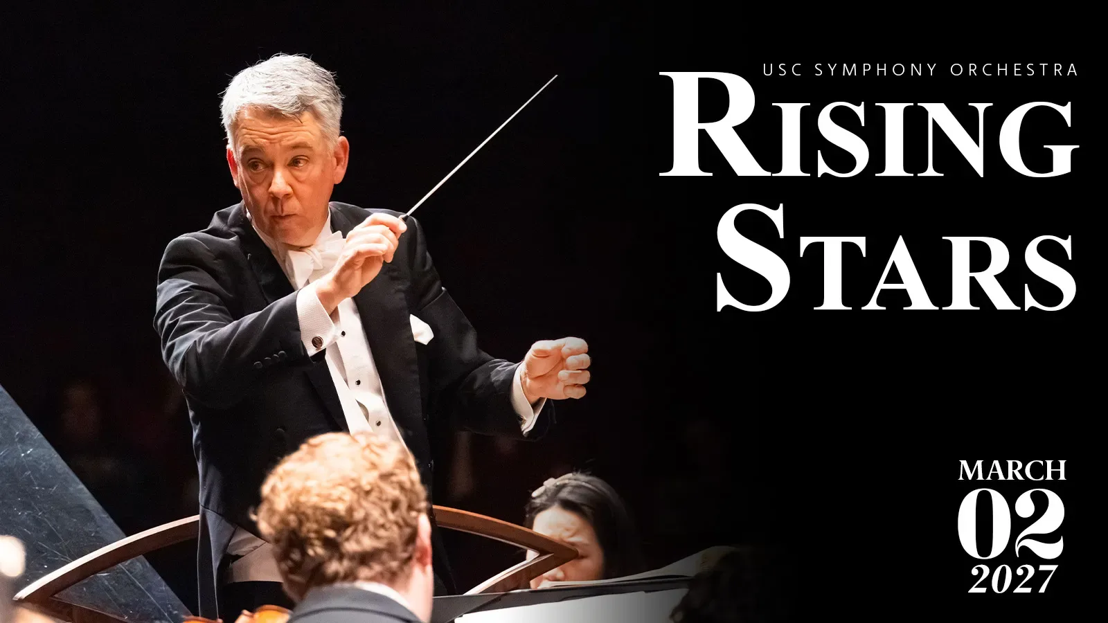 A photo of Scott Weiss conducting against a black background. The text 